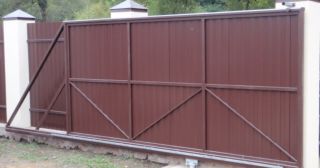 Купить откатные ворота из профнастила Курчатов, цена от 1795 руб.