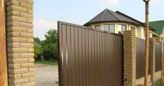 Купить откатные ворота из профнастила Курчатов, цена от 1795 руб.